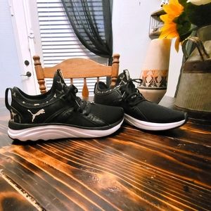 Black and cheetah print Puma's